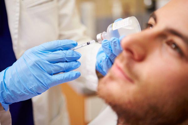 Doctor performing Botox treatment