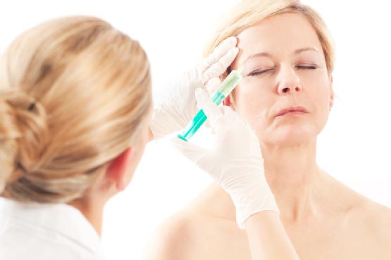 Doctor performing Botox treatment