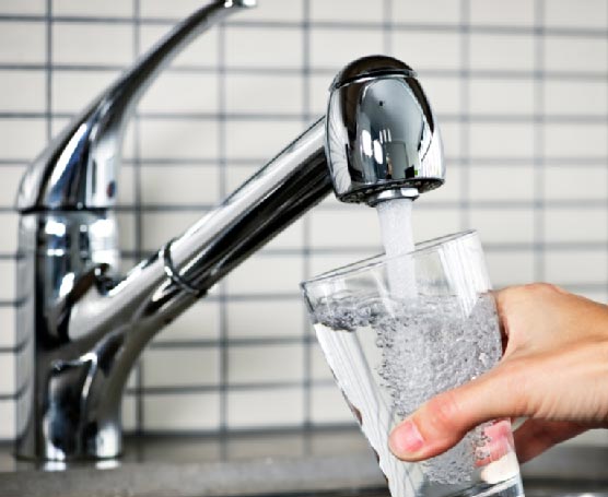 Filling glass of tap water