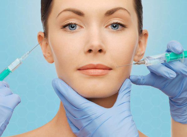 Doctor performing Botox treatment