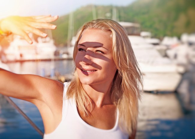 Beautiful Women taking sun light