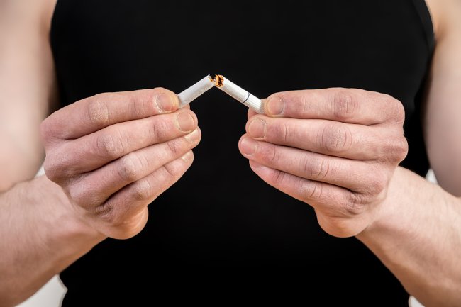 Women holding cigarette